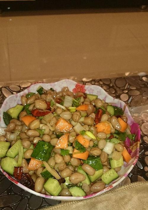 香酥芝麻花生的制作秘笈（让你做出口感的香酥芝麻花生，享受美味与健康的双重快乐）