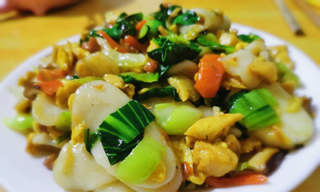 小青菜炒年糕怎么做？步骤和技巧有哪些？