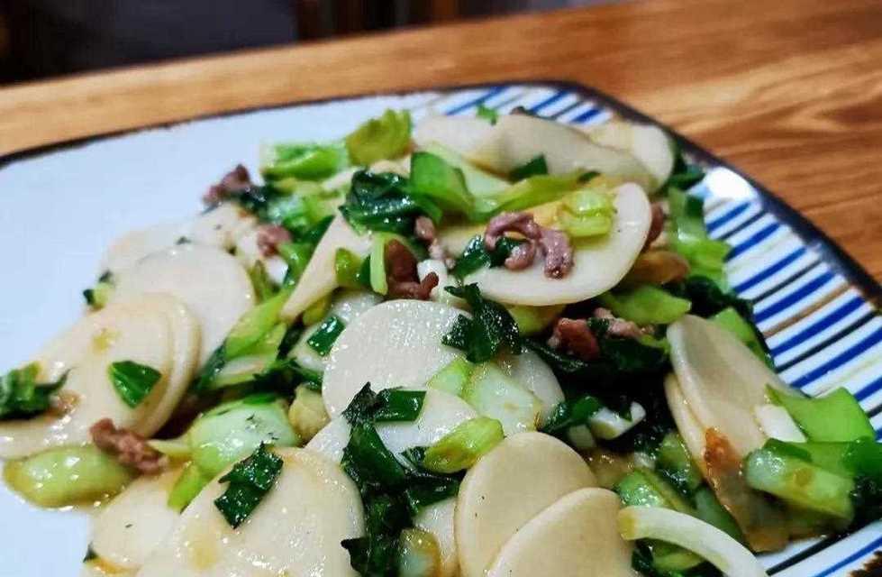 小青菜炒年糕怎么做？步骤和技巧有哪些？