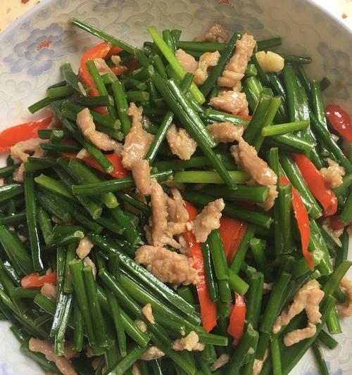 香干肉丝炒韭菜花怎么做？步骤和技巧有哪些？